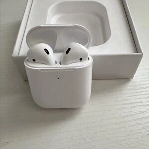White airpods 2nd generation Magsafe White case comes with charger.